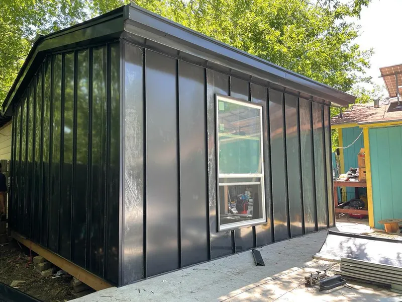 Black standing seam metal wall panels for Metal Roof Installation in Munford