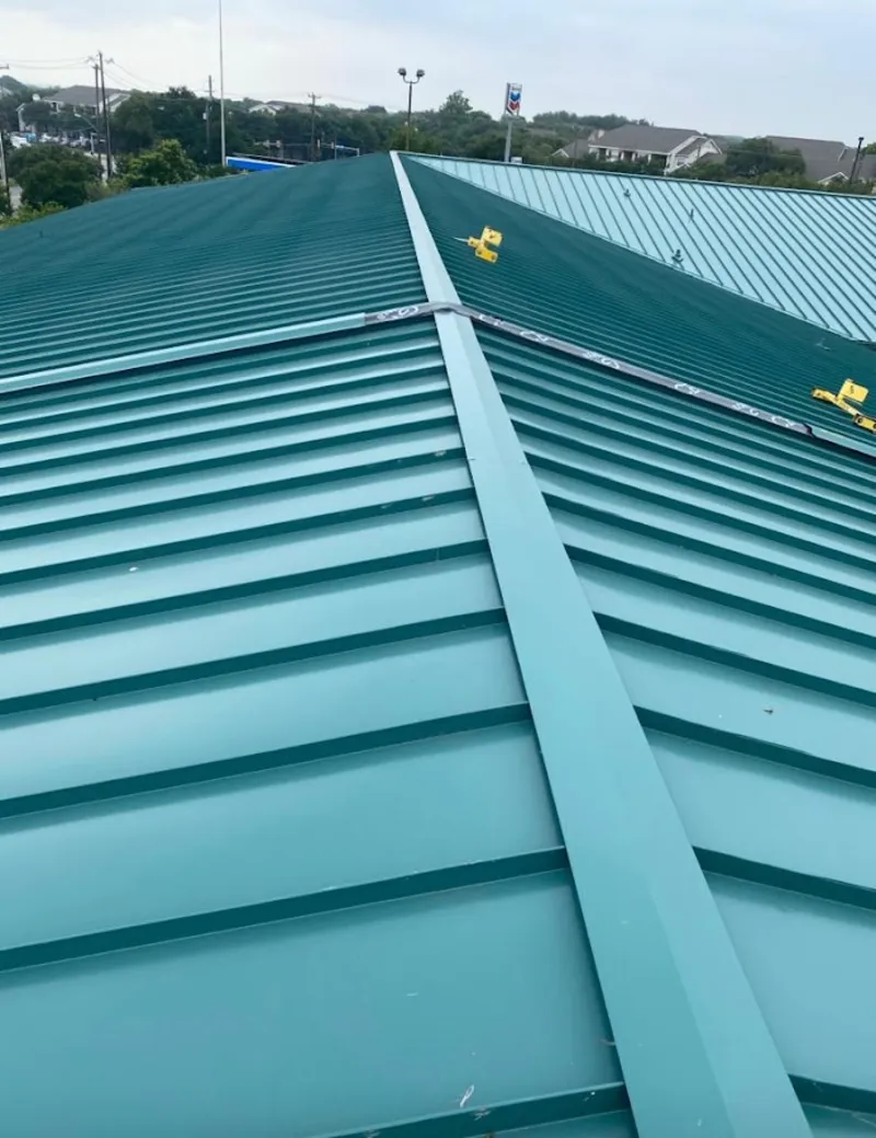 Green commercial metal roof ridge and valley for Metal Roof Repair in Munford